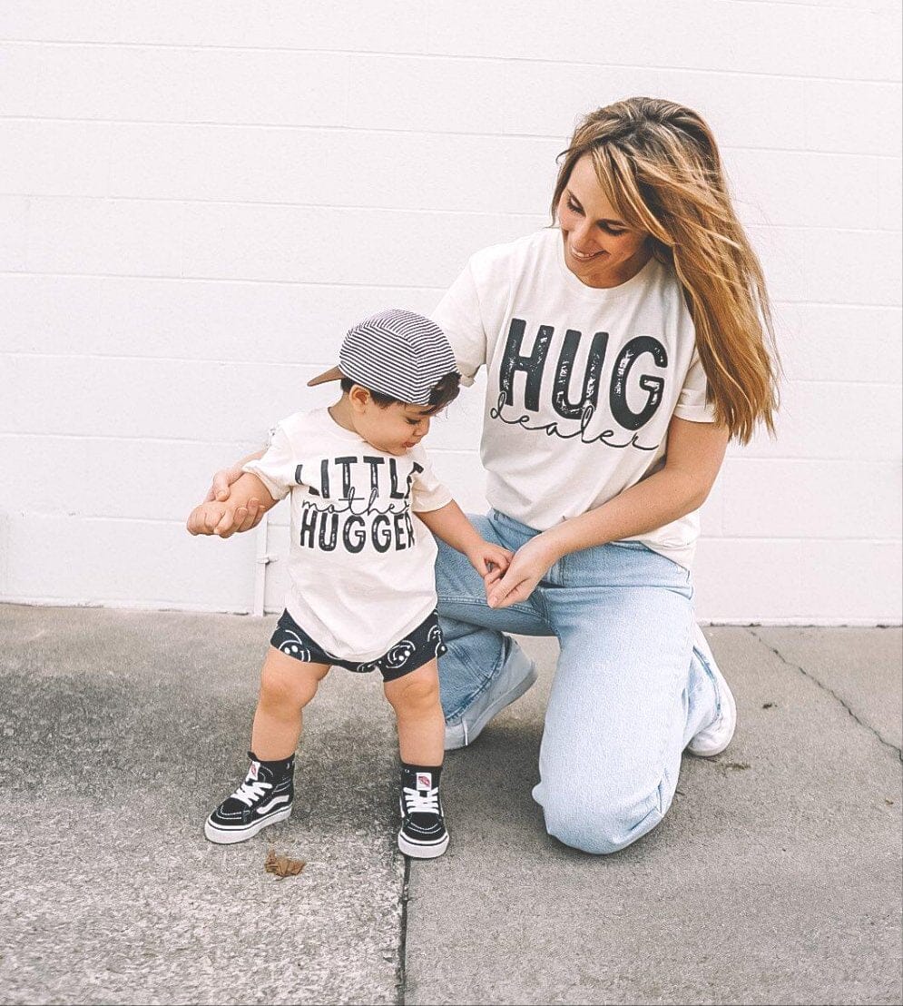 A mom and her son wearing the Little Mother Hugger Set