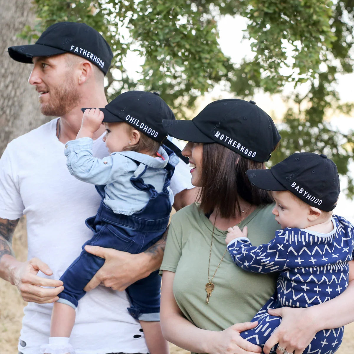 A family wearing matching hats