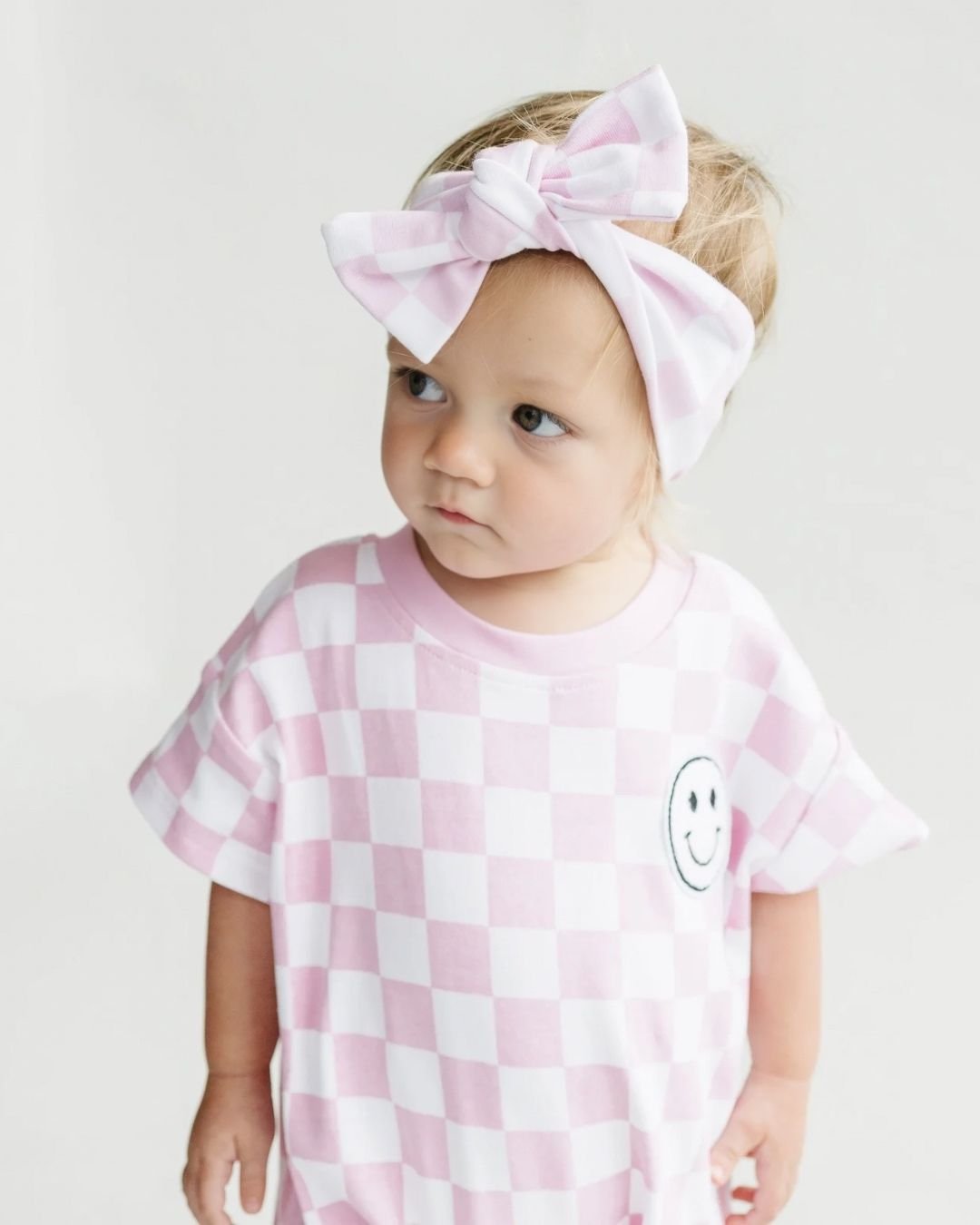 Short Sleeve Bubble Romper | Checkered Smiley Pink