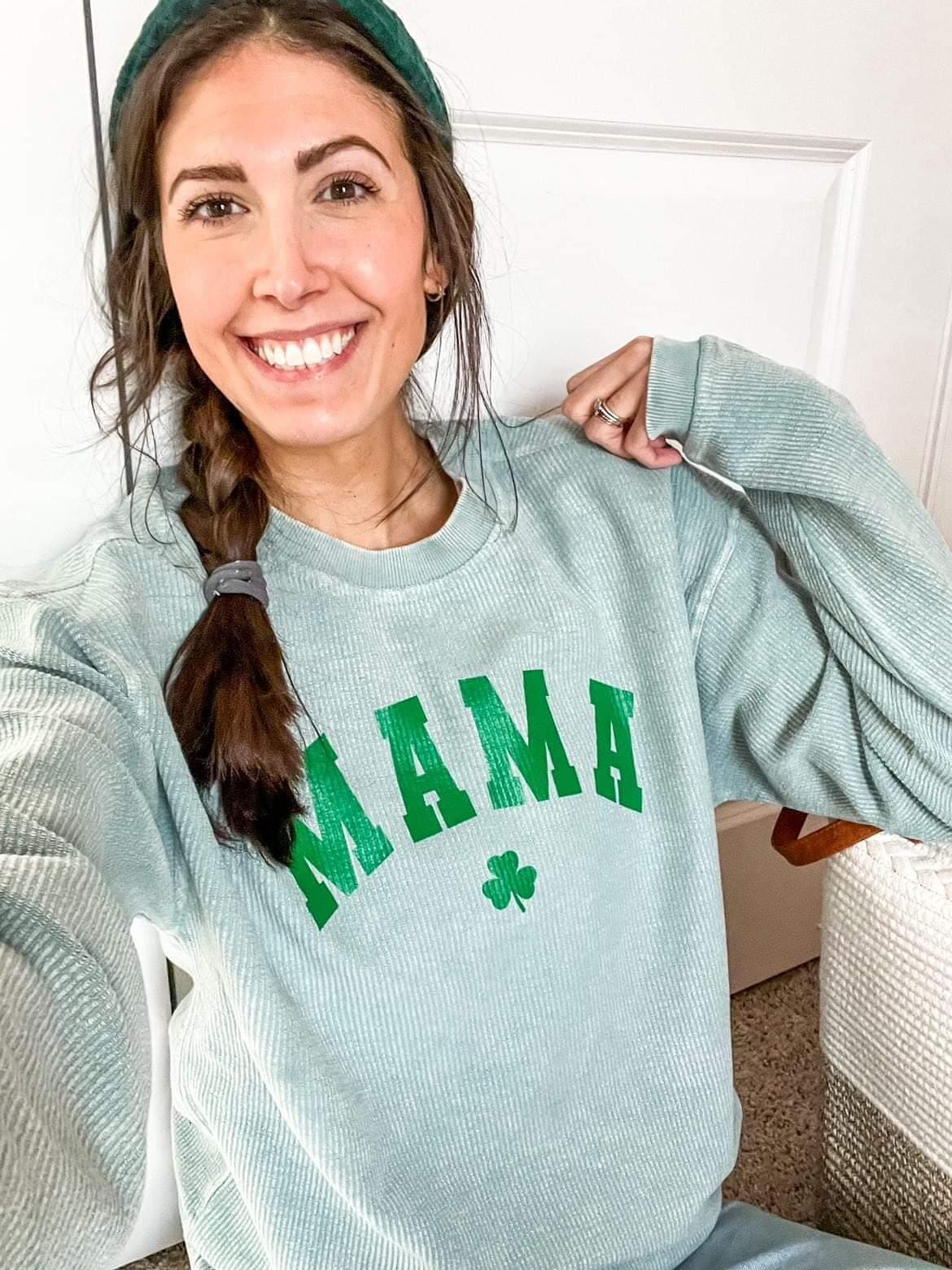A mom wearing the St. Paddy’s Mama Cord St. Patrick’s Day sweatshirt